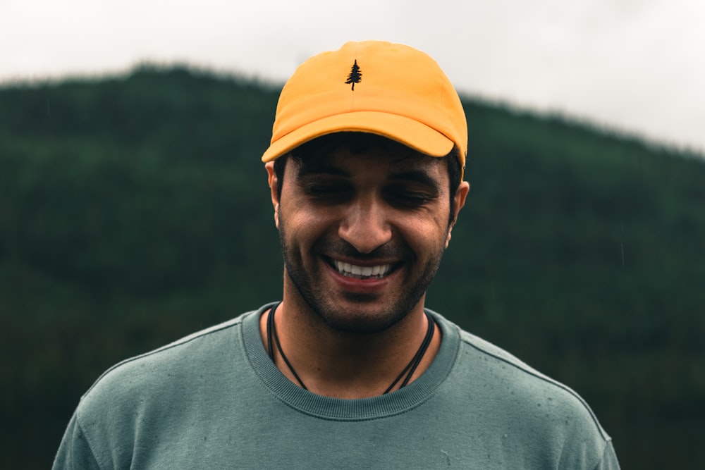 a man wearing a yellow hat