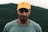 a man wearing a yellow hat