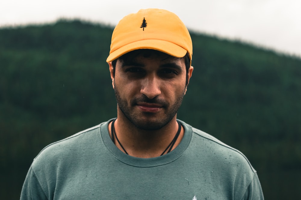 a man wearing a yellow hat