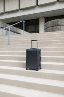 Cinematic shot of a travel bag with steel and glass reflections highlighting its functional elegance
