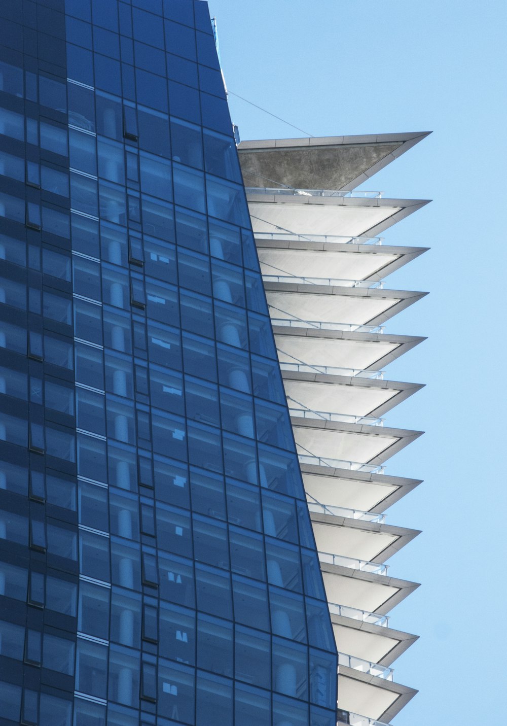 a tall building with glass windows