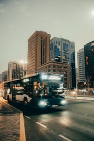 a bus driving down a street