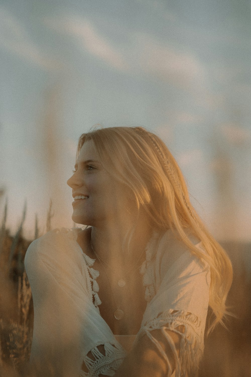 a woman with long blonde hair