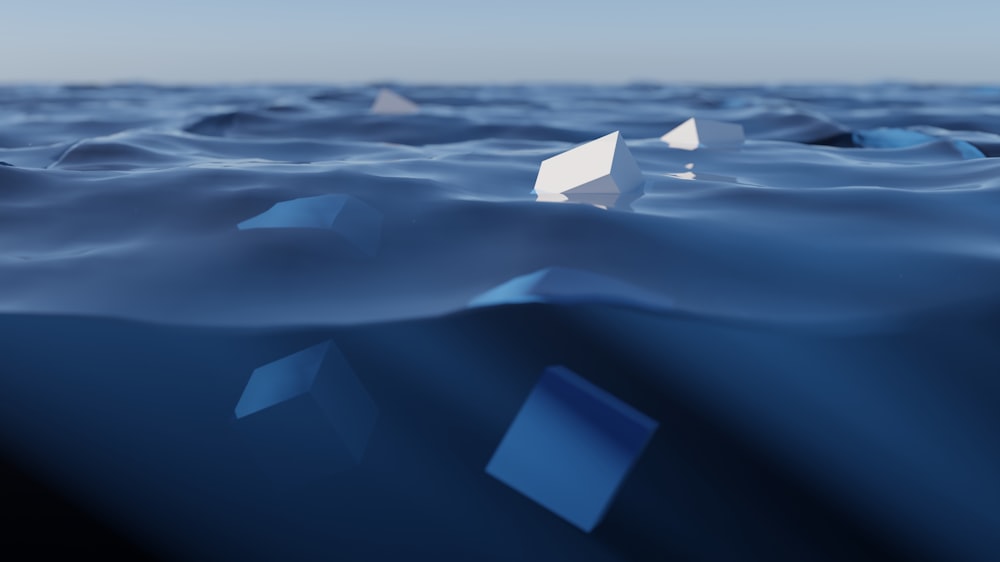 a group of icebergs in the water