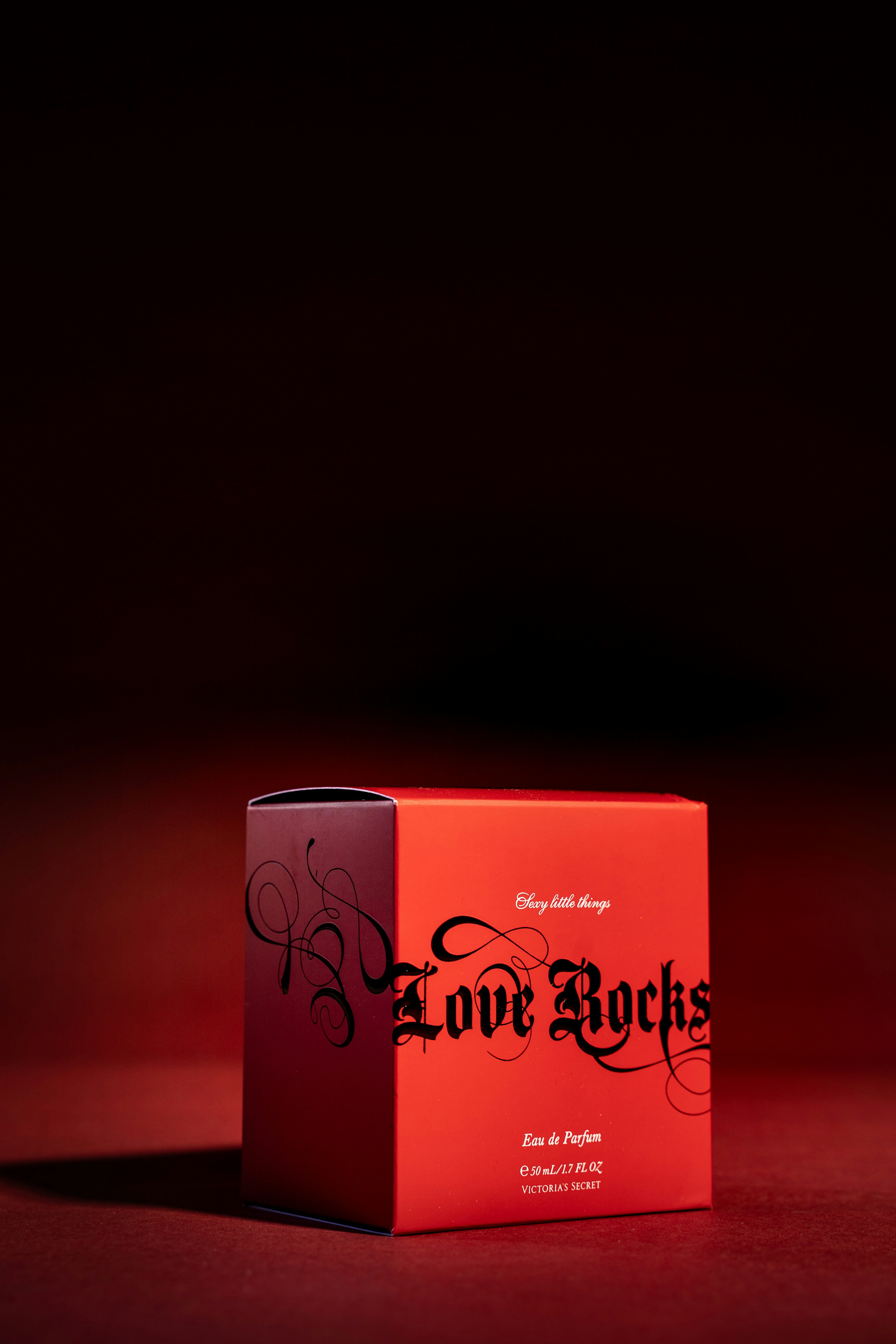 a pink box with a logo on it