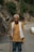 An older man hiking on a scenic trail, embracing a healthy and active lifestyle.