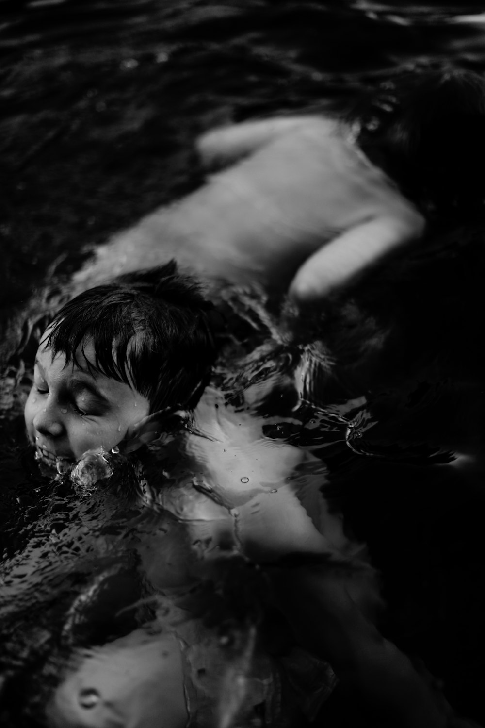 a person lying in the water
