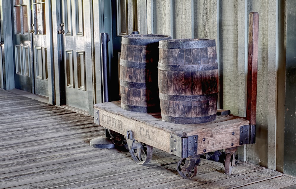 a couple of barrels on a cart