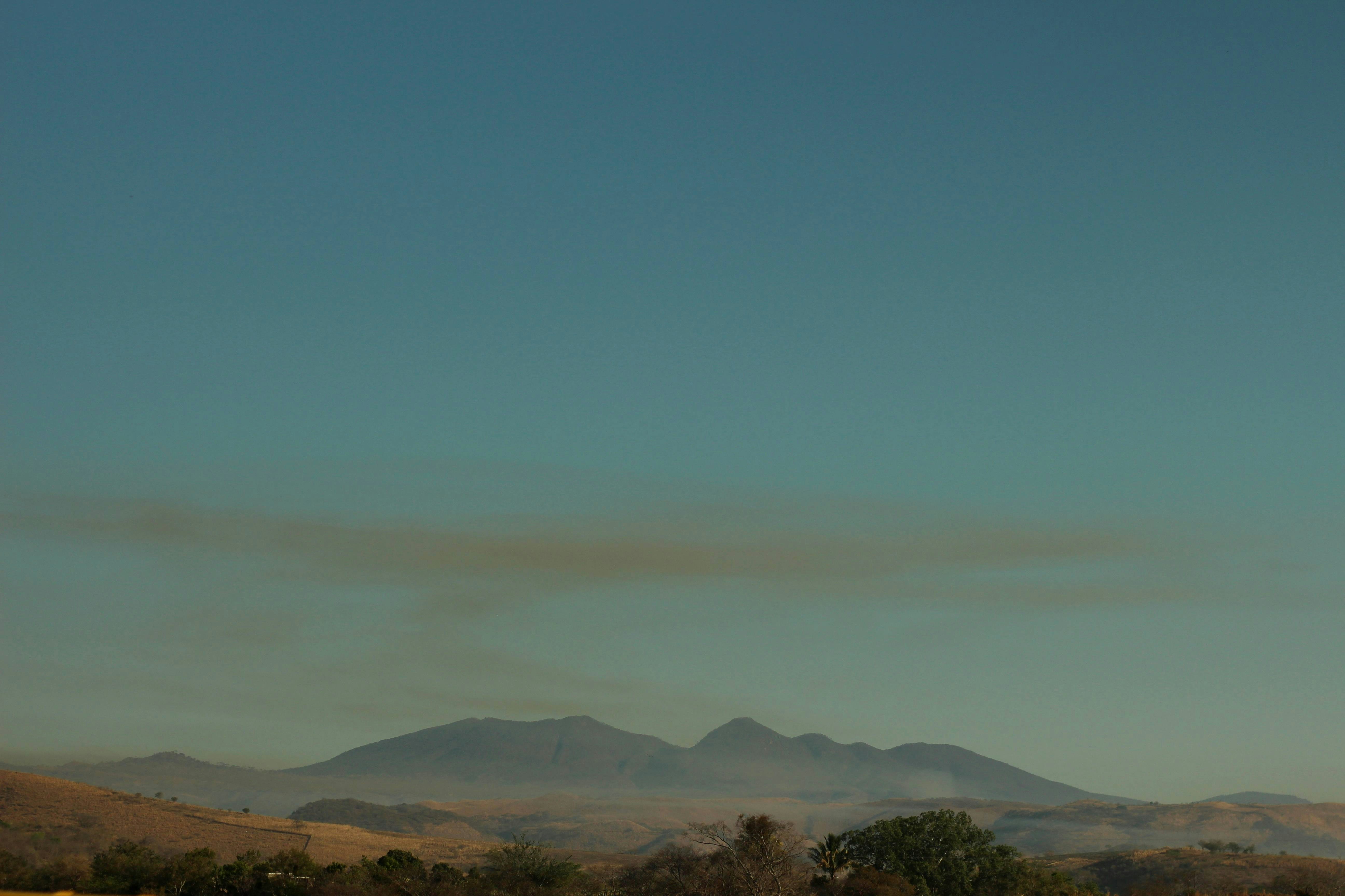 a landscape with hills and trees