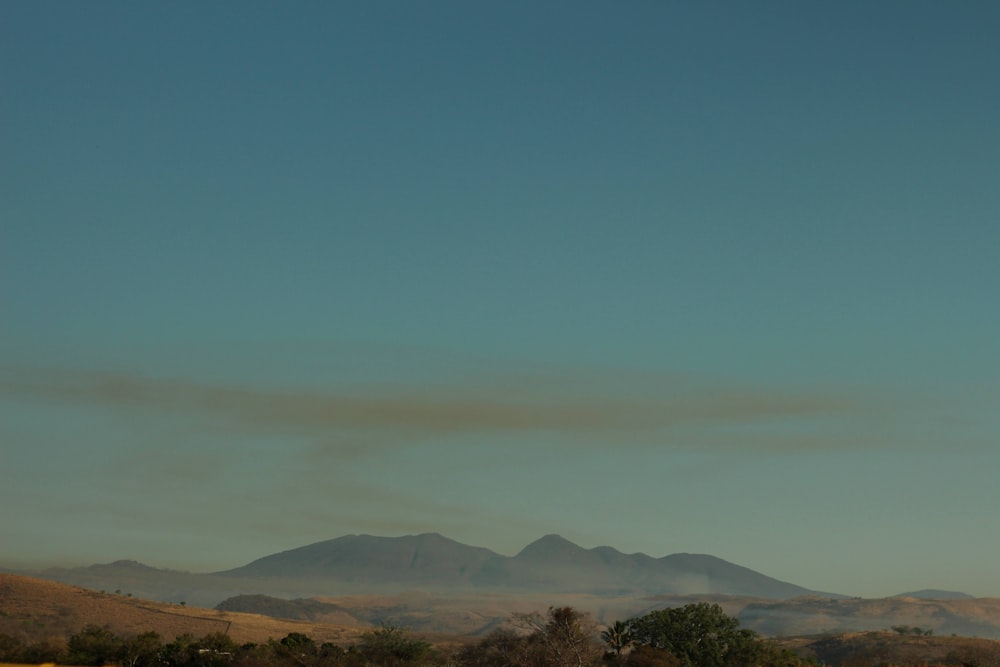 a landscape with hills and trees