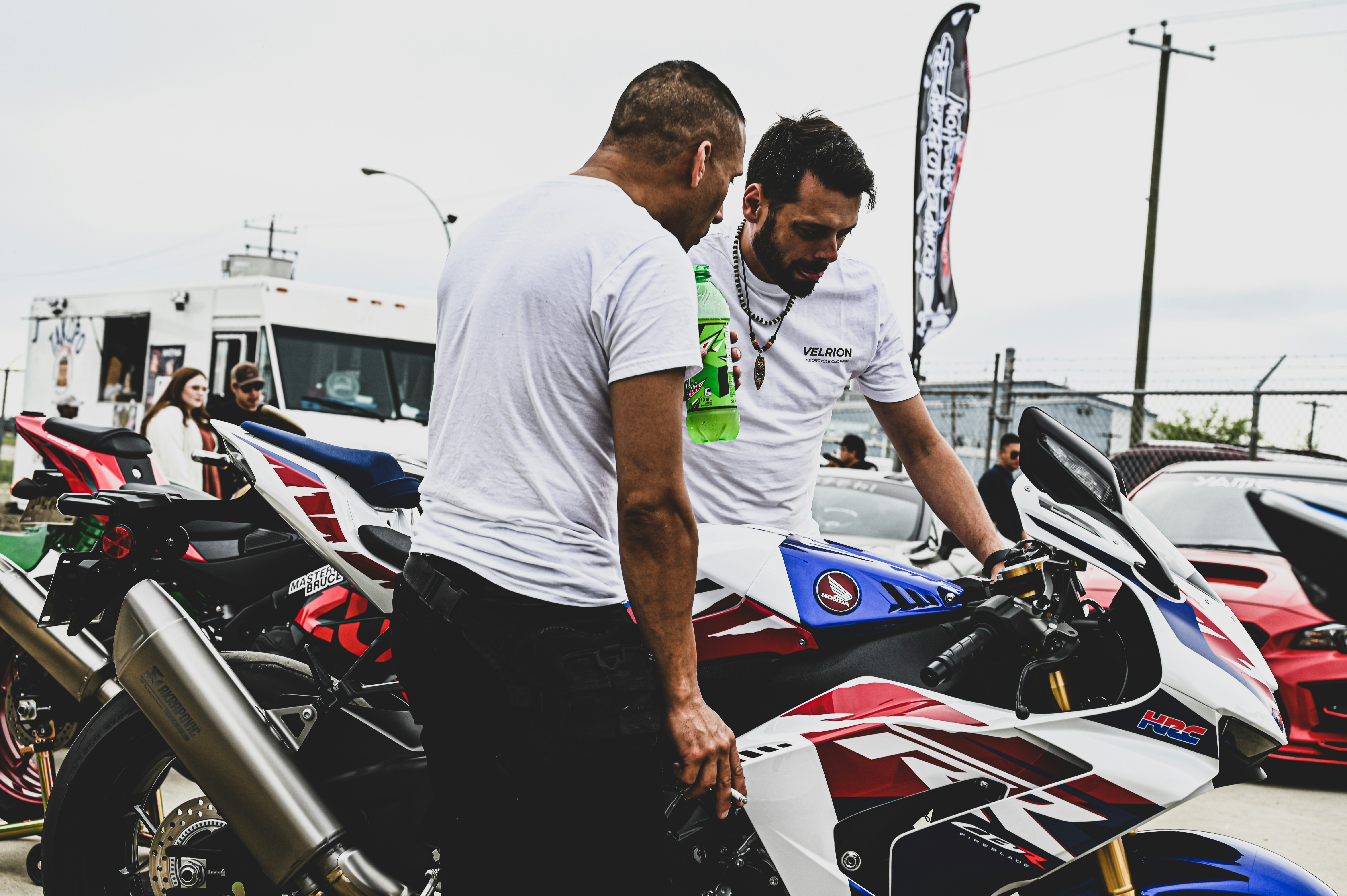 Two motorcycle buyers prepared to pick up a bike from a Michigan seller