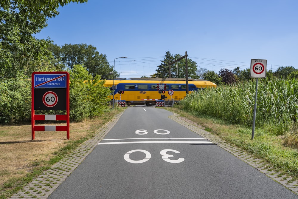 a train going by a sign