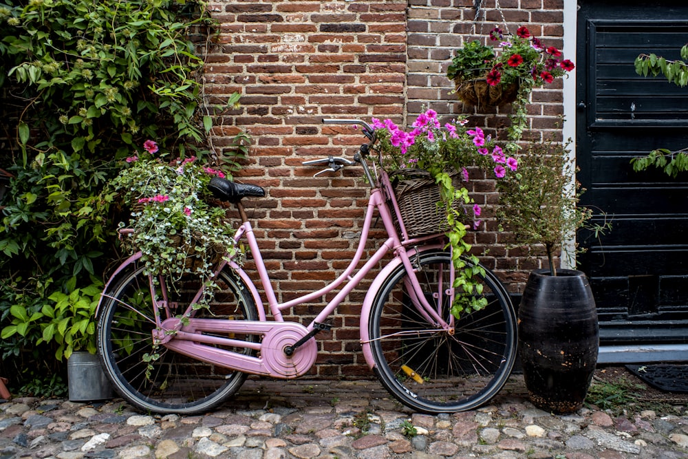 a pink bicycle with flowers