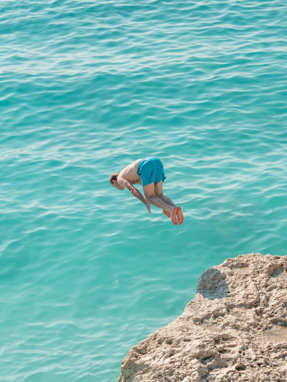 a person diving into the water
