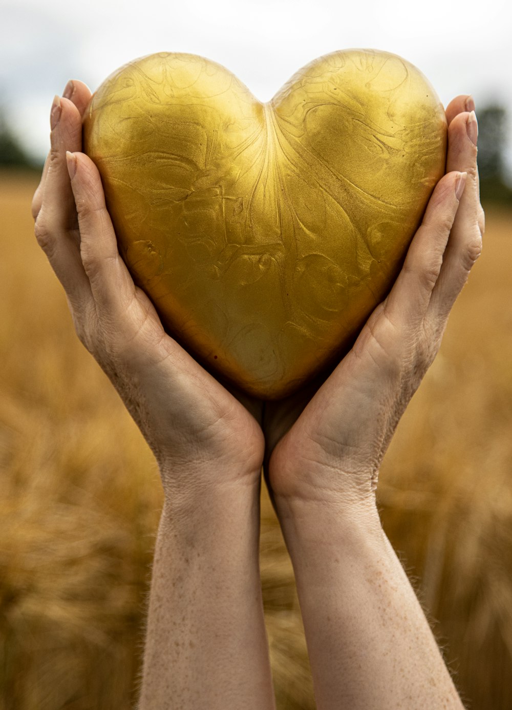 a person holding a fruit