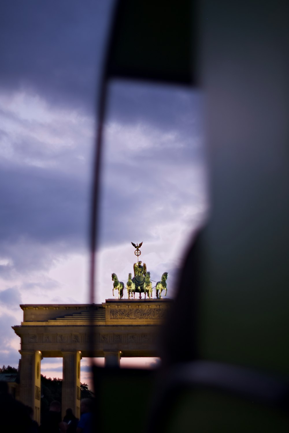 a statue of a person holding a torch