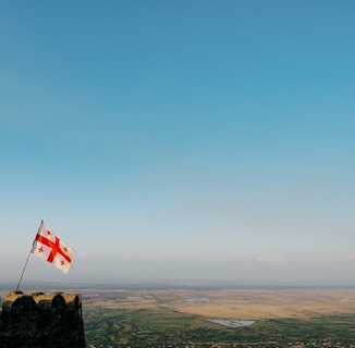 a flag on a rock