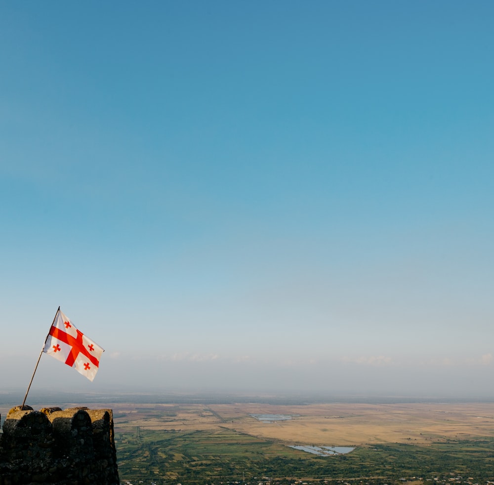 a flag on a rock