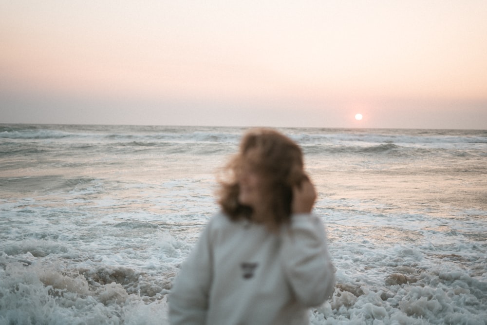 a person sitting on a beach