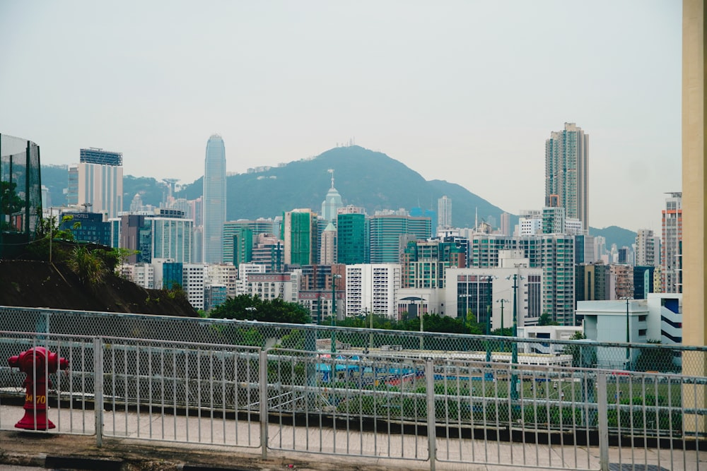 a city with a mountain in the background