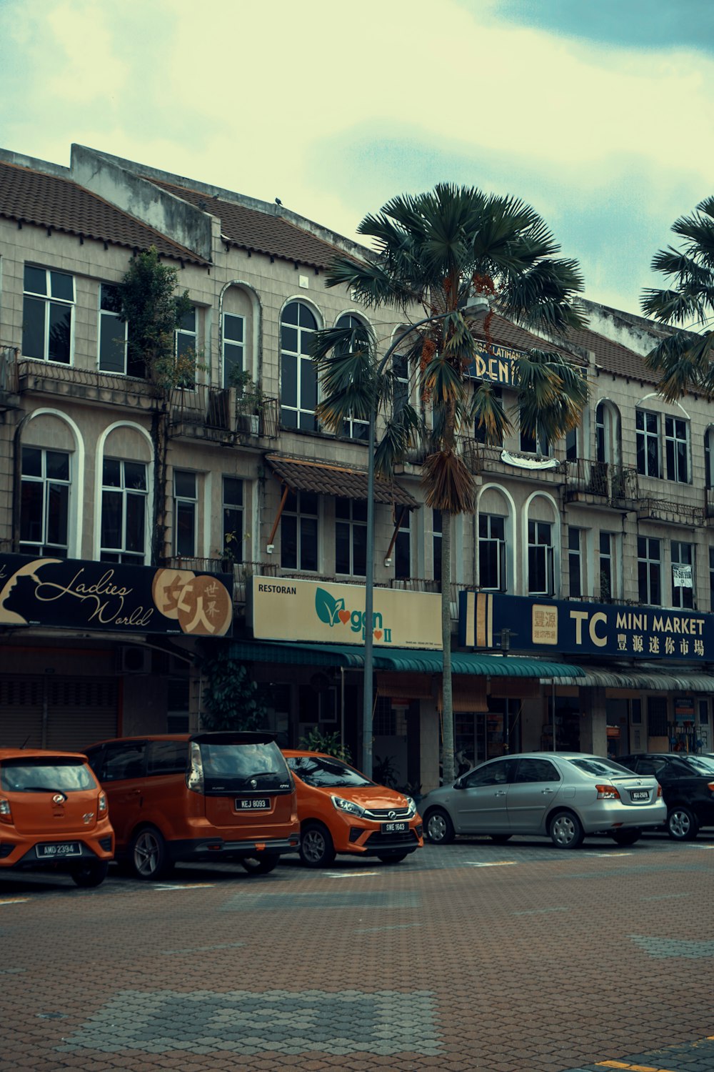 a group of cars parked outside a building