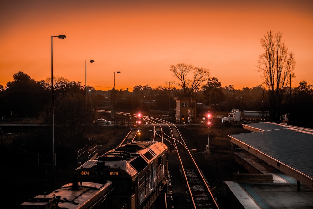 train tracks with trains on them