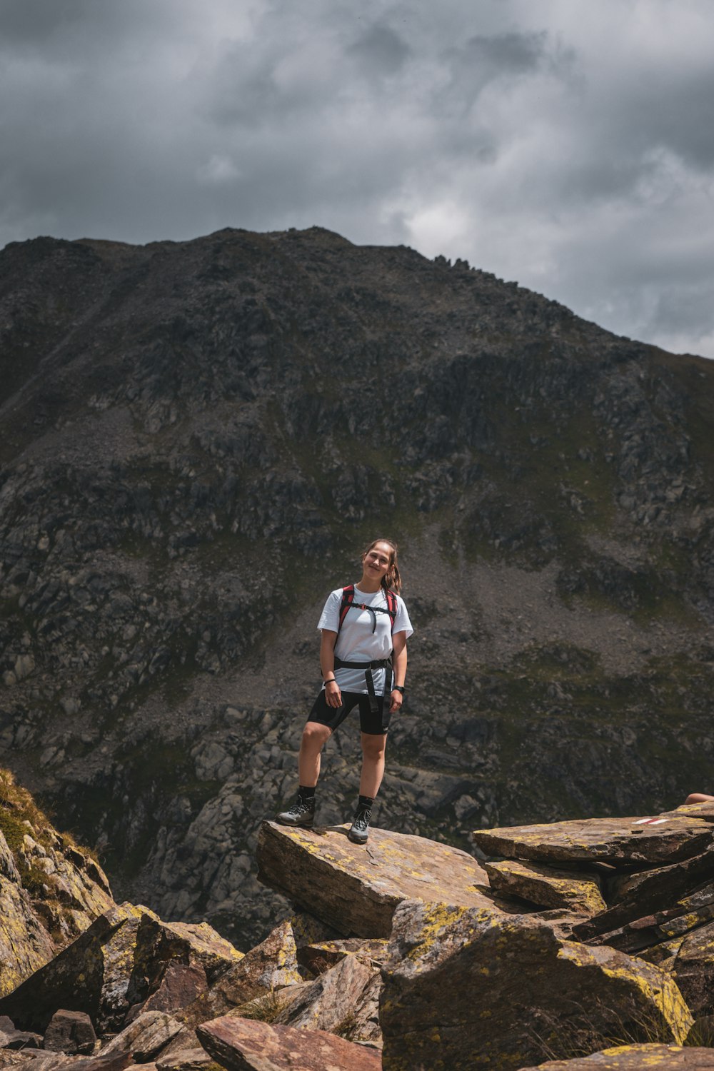 a man standing on a rocky mountain