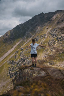 a man standing on a rock