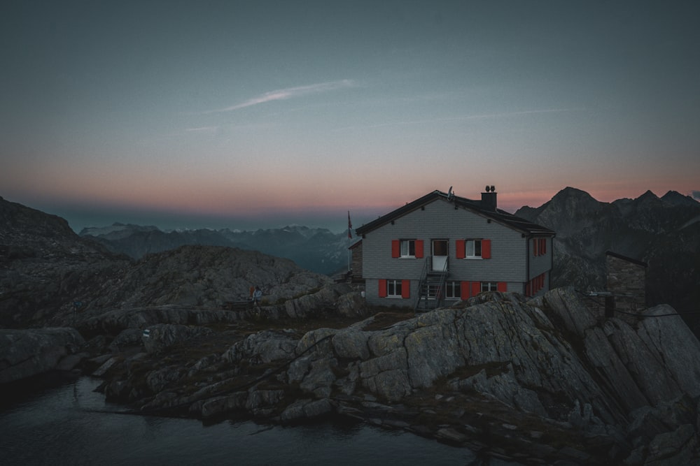 a house on a rocky hill