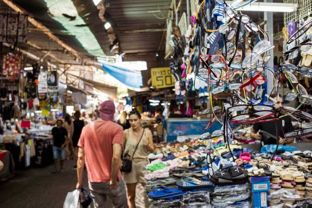 people walking in a market