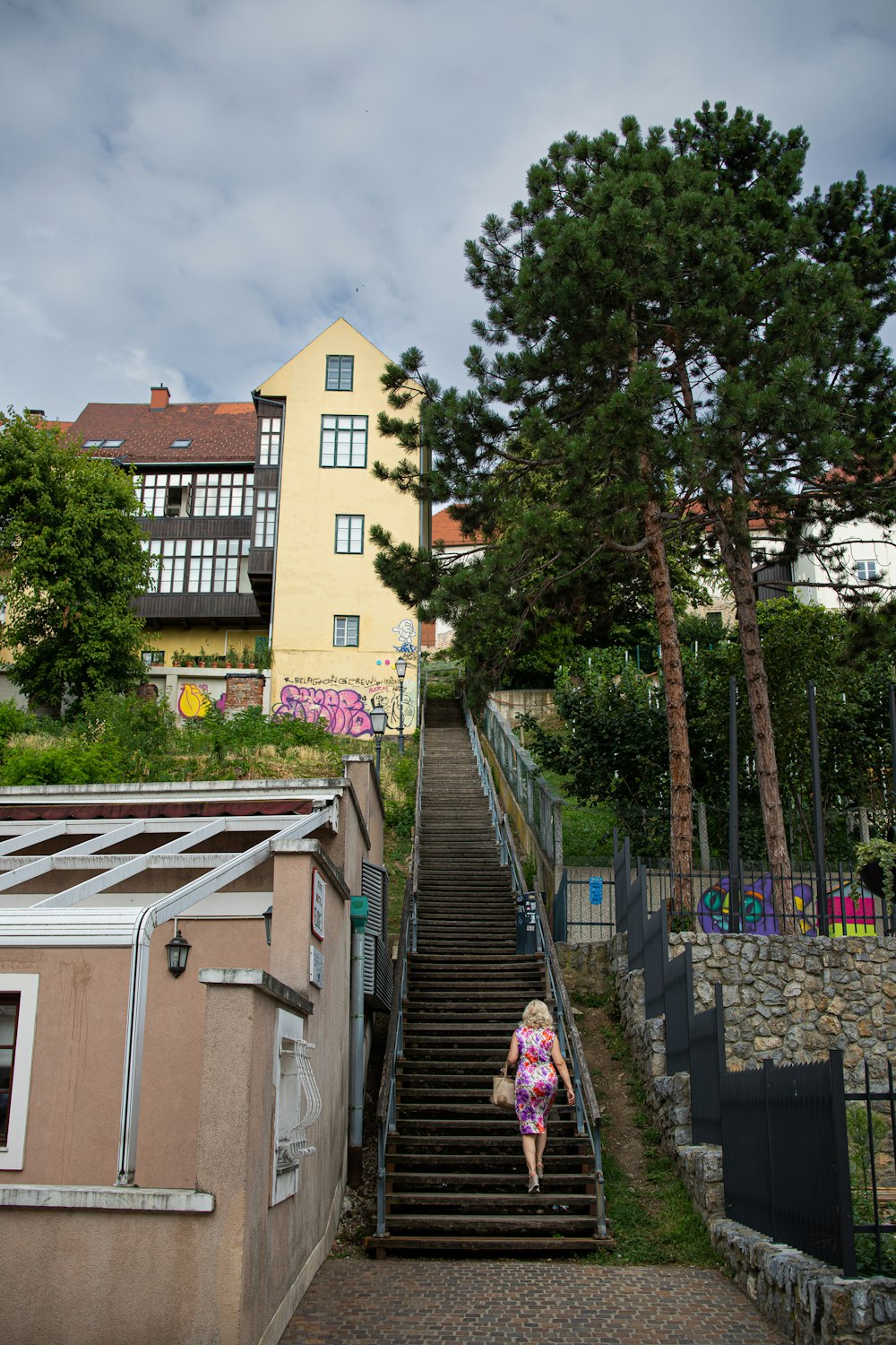 a person walking up a set of stairs