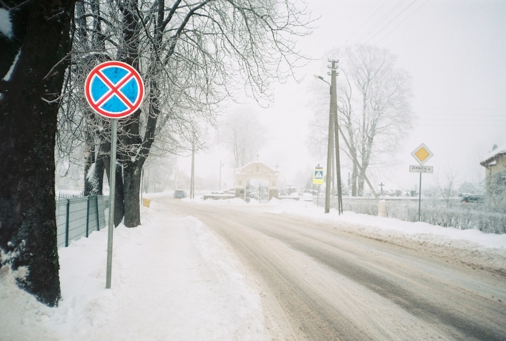 a road with snow on the side