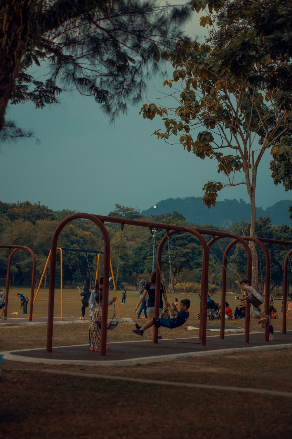 a group of people playing on a playground