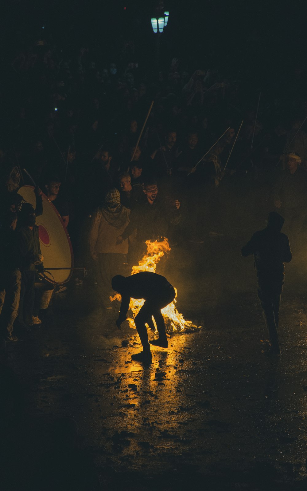 a group of people around a fire