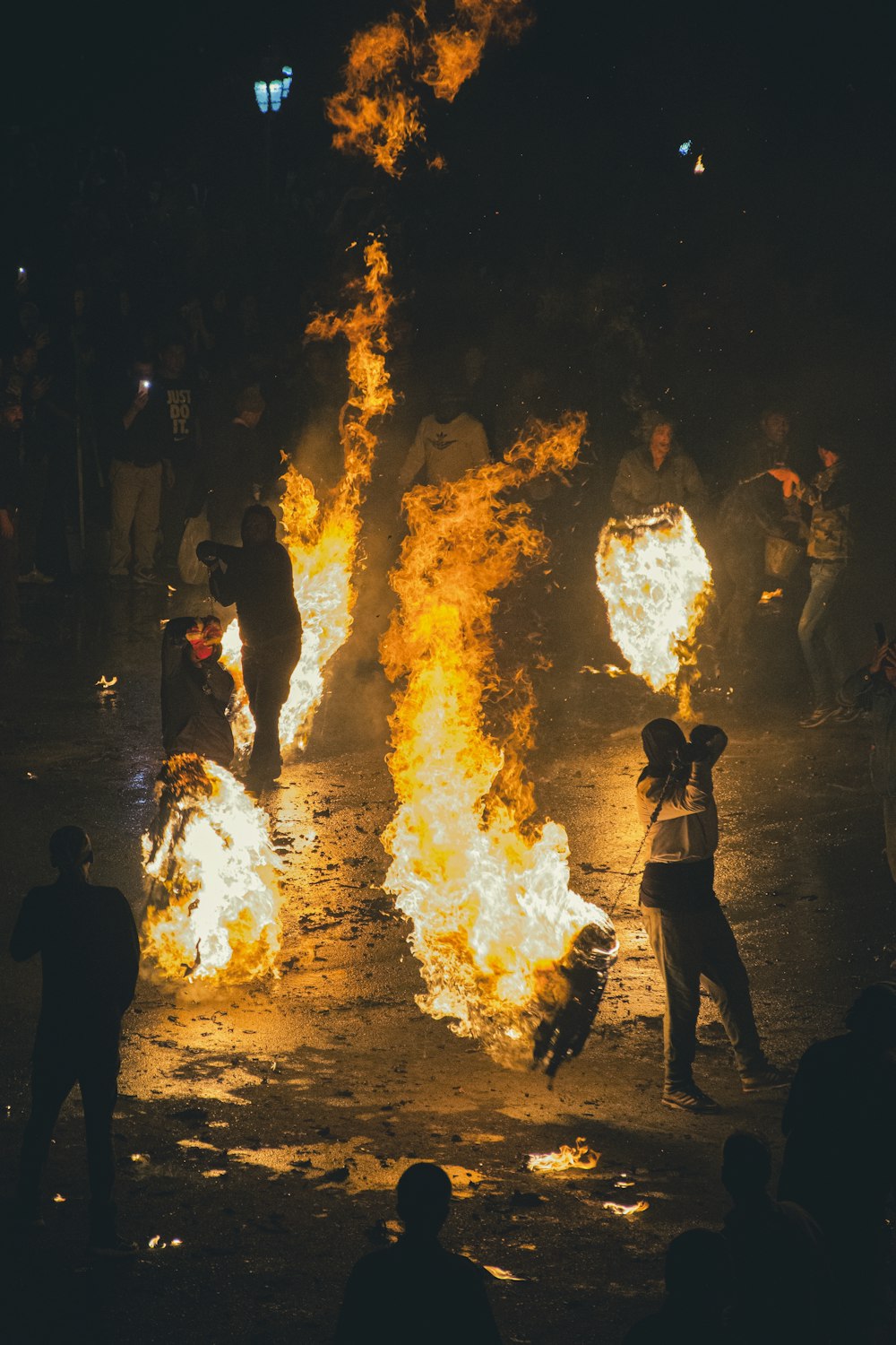 a group of people around a fire