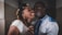 A joyful couple sharing a kiss on their wedding day.
