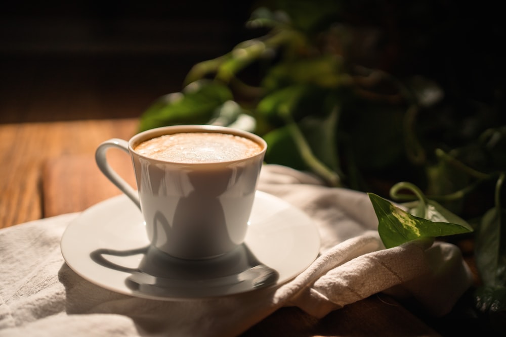 a cup of coffee on a saucer