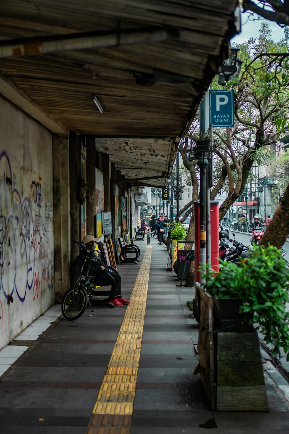 a bicycle parked on the side of a street