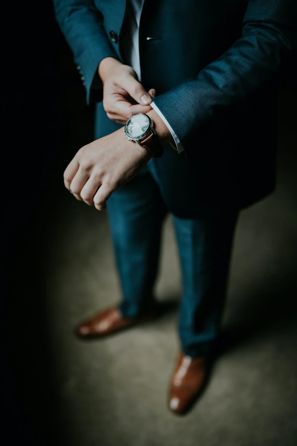 a person wearing a suit and tie