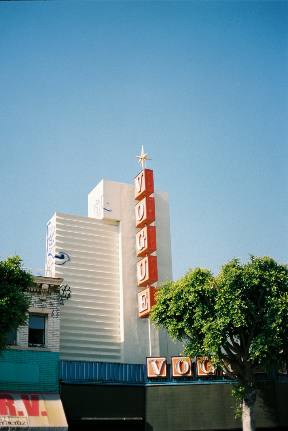 a tall building with a cross on top