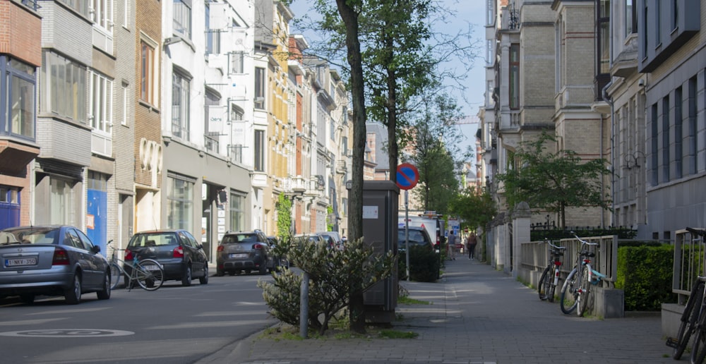 a street with cars and bicycles