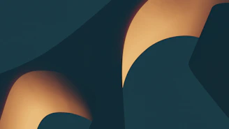 Abstract shapes in warm tones reflecting the website's unique color scheme.
