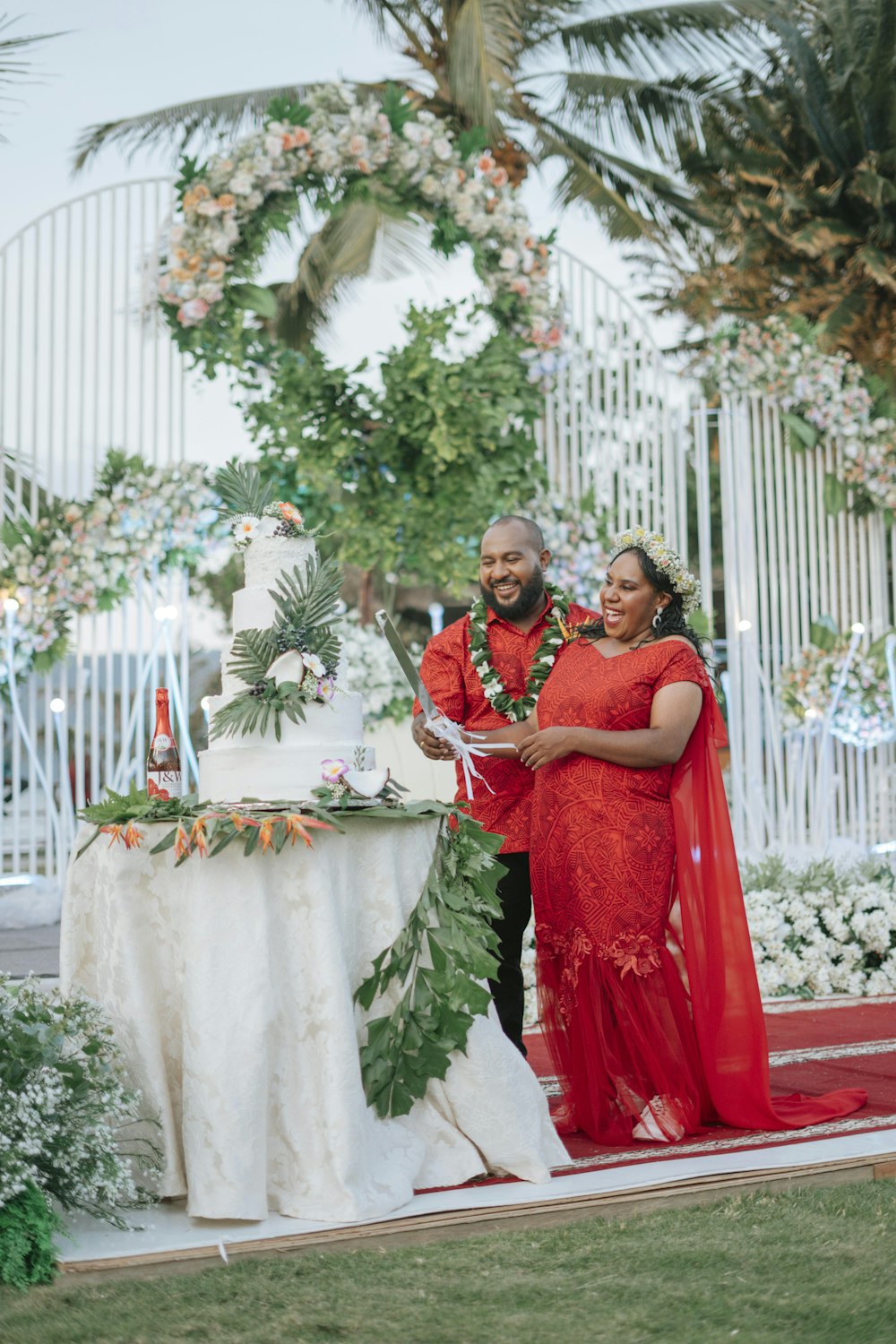 a man and woman in red dress