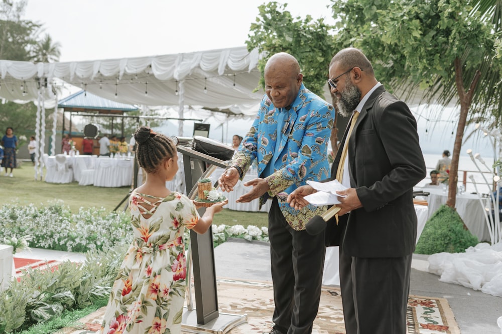 a man handing a woman a bouquet of flowers