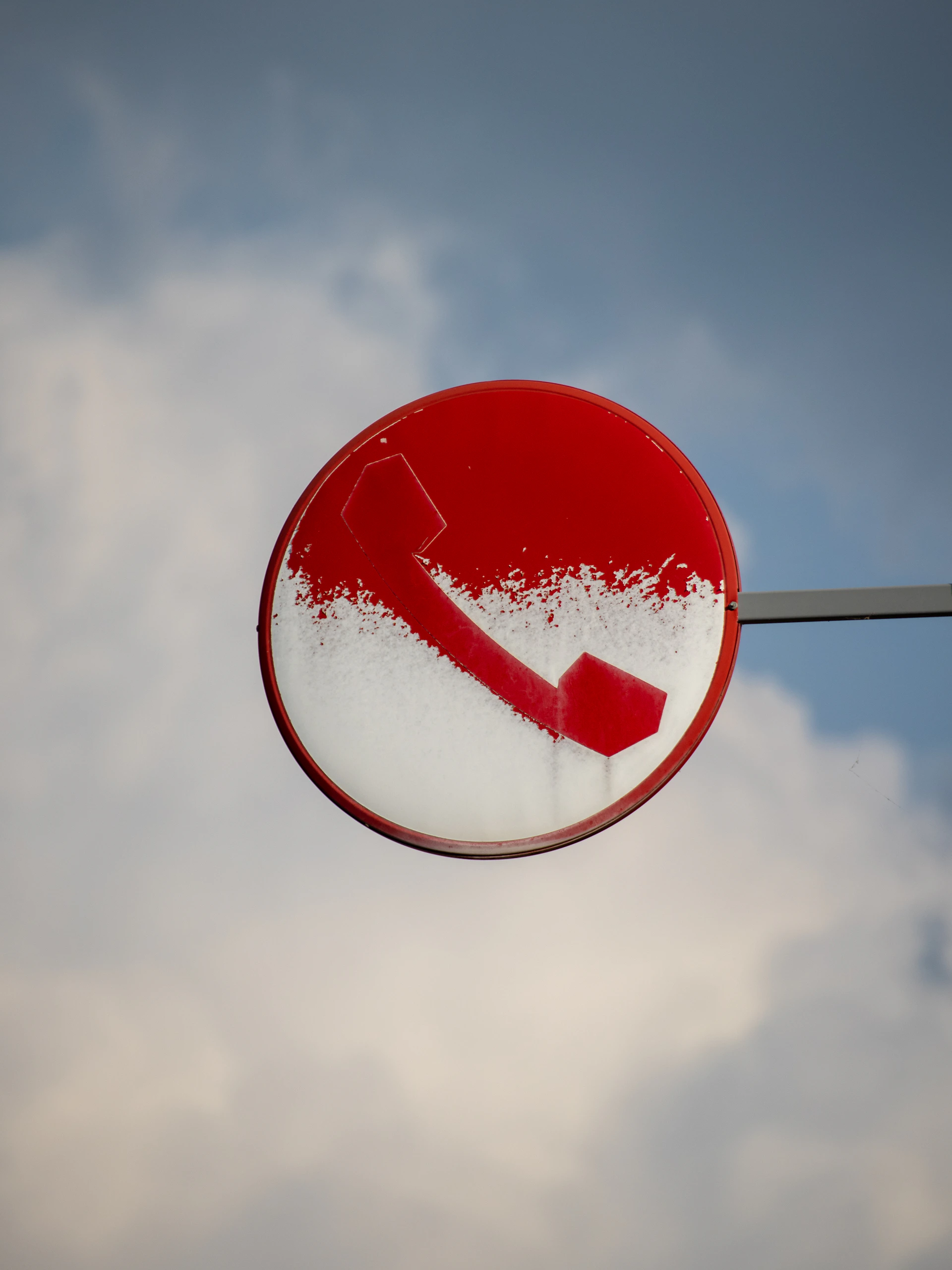 a red sign with a baseball logo