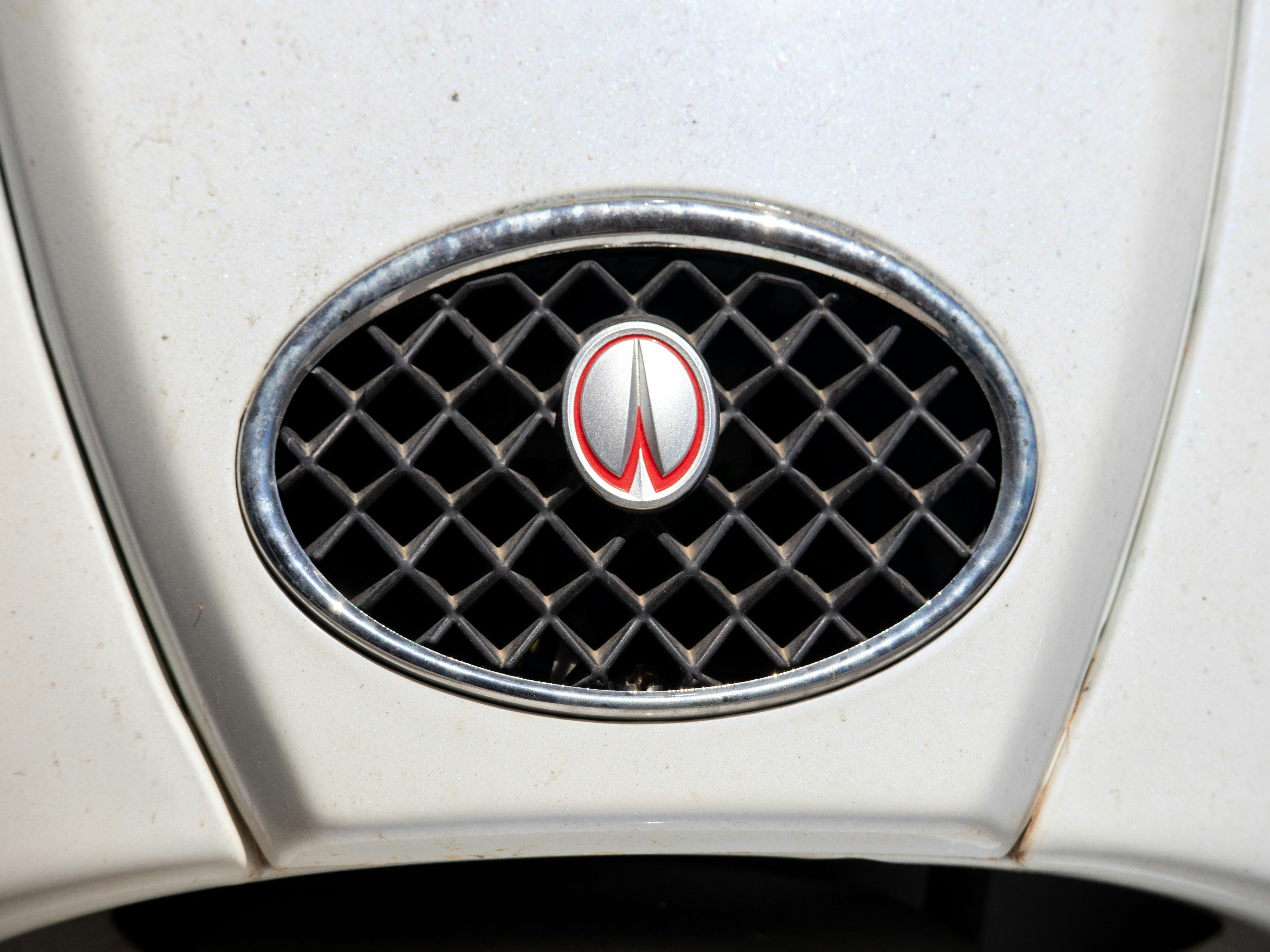 a close up of a car's headlight