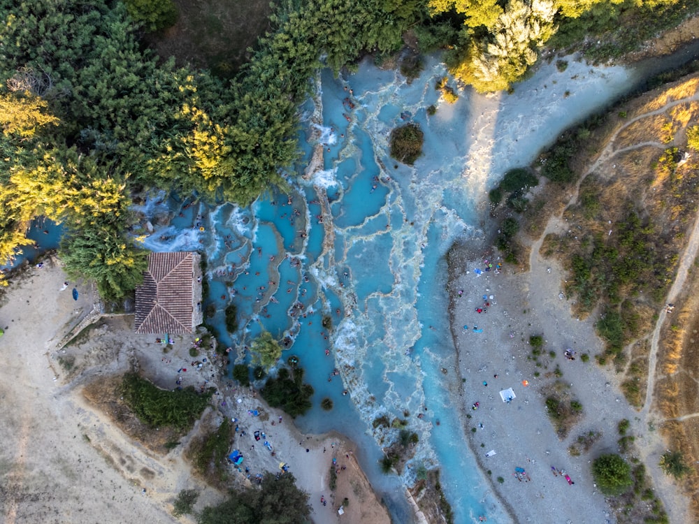 a river with a small bridge