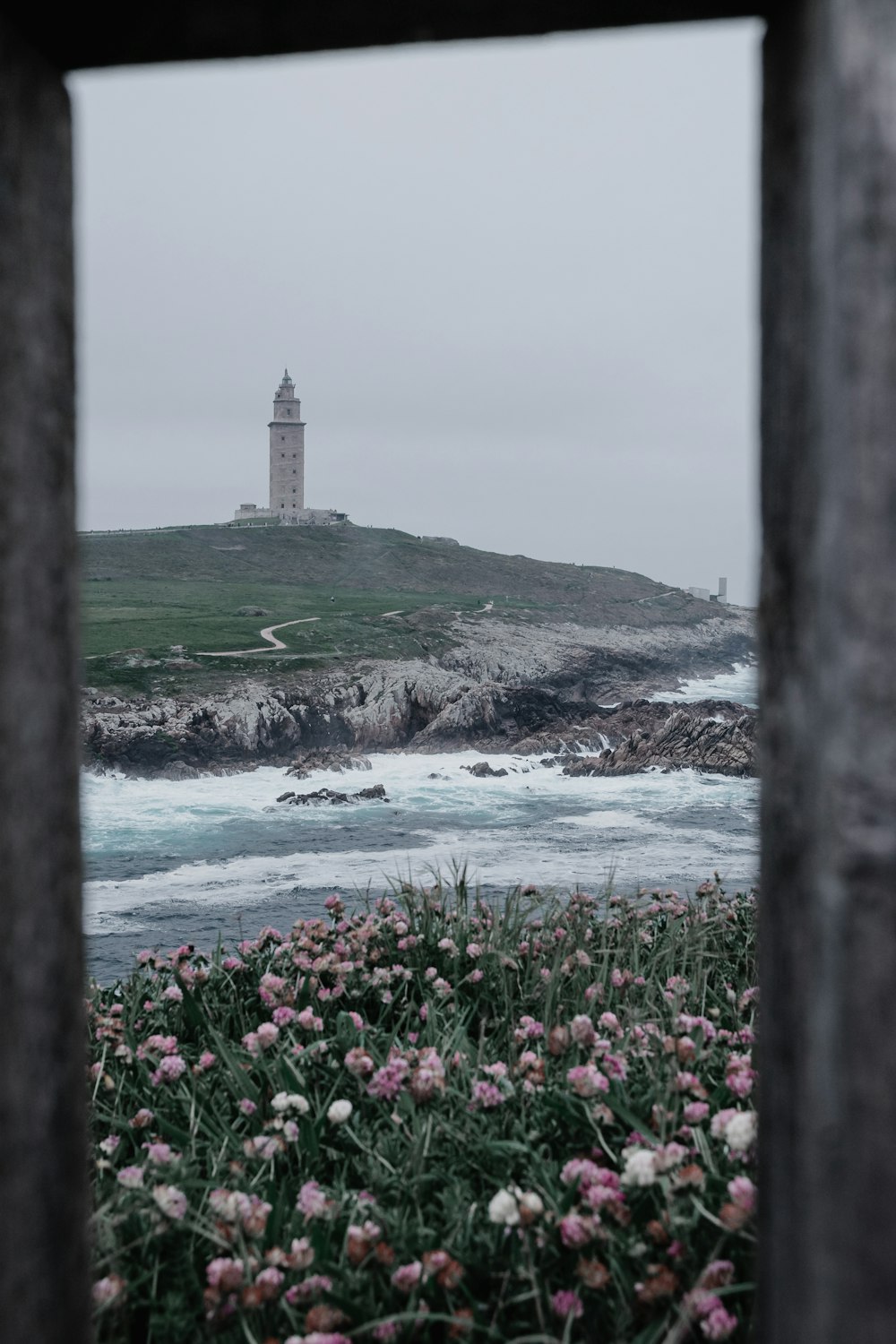 a lighthouse on a hill