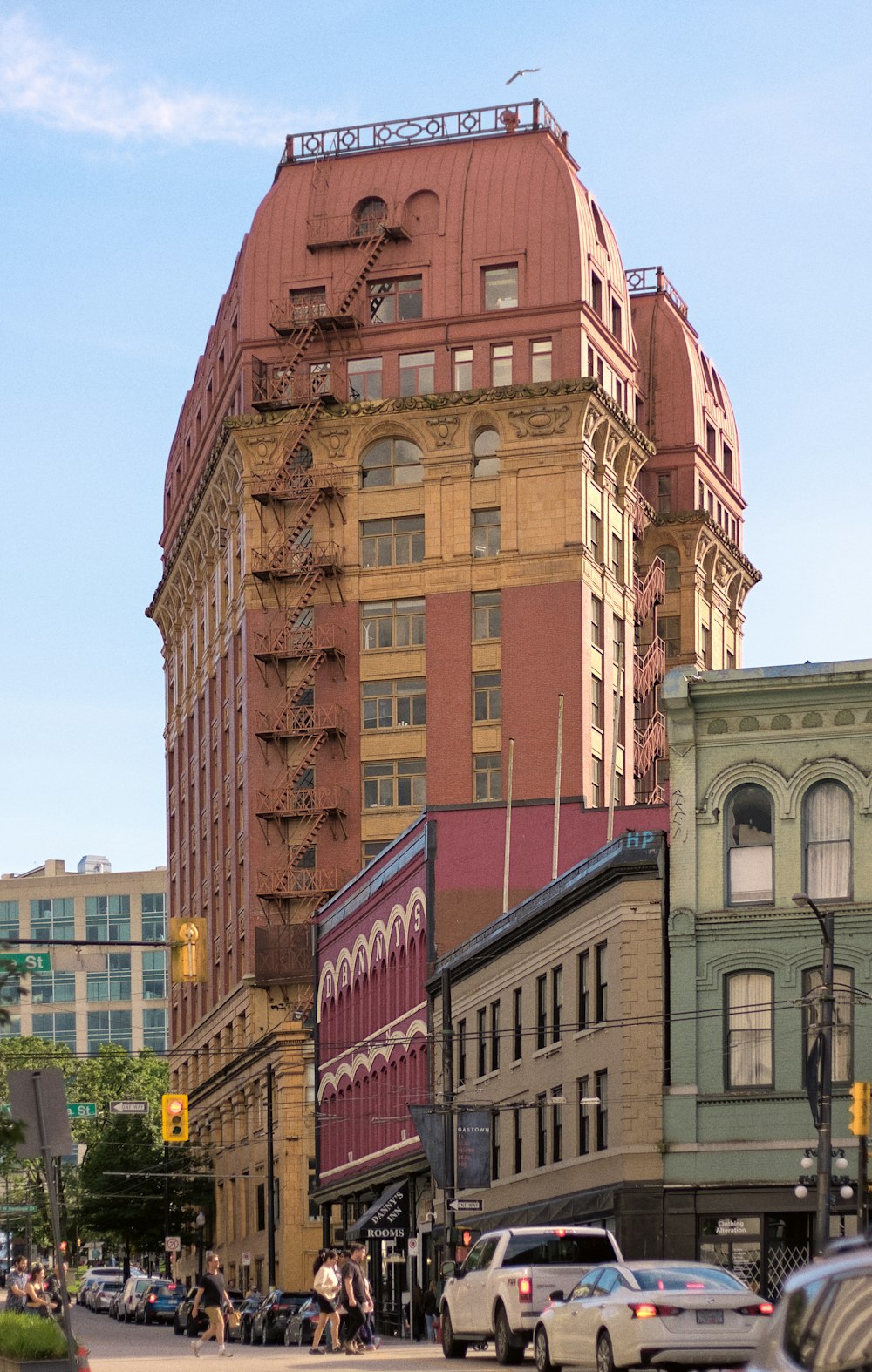 a tall building with a red sign