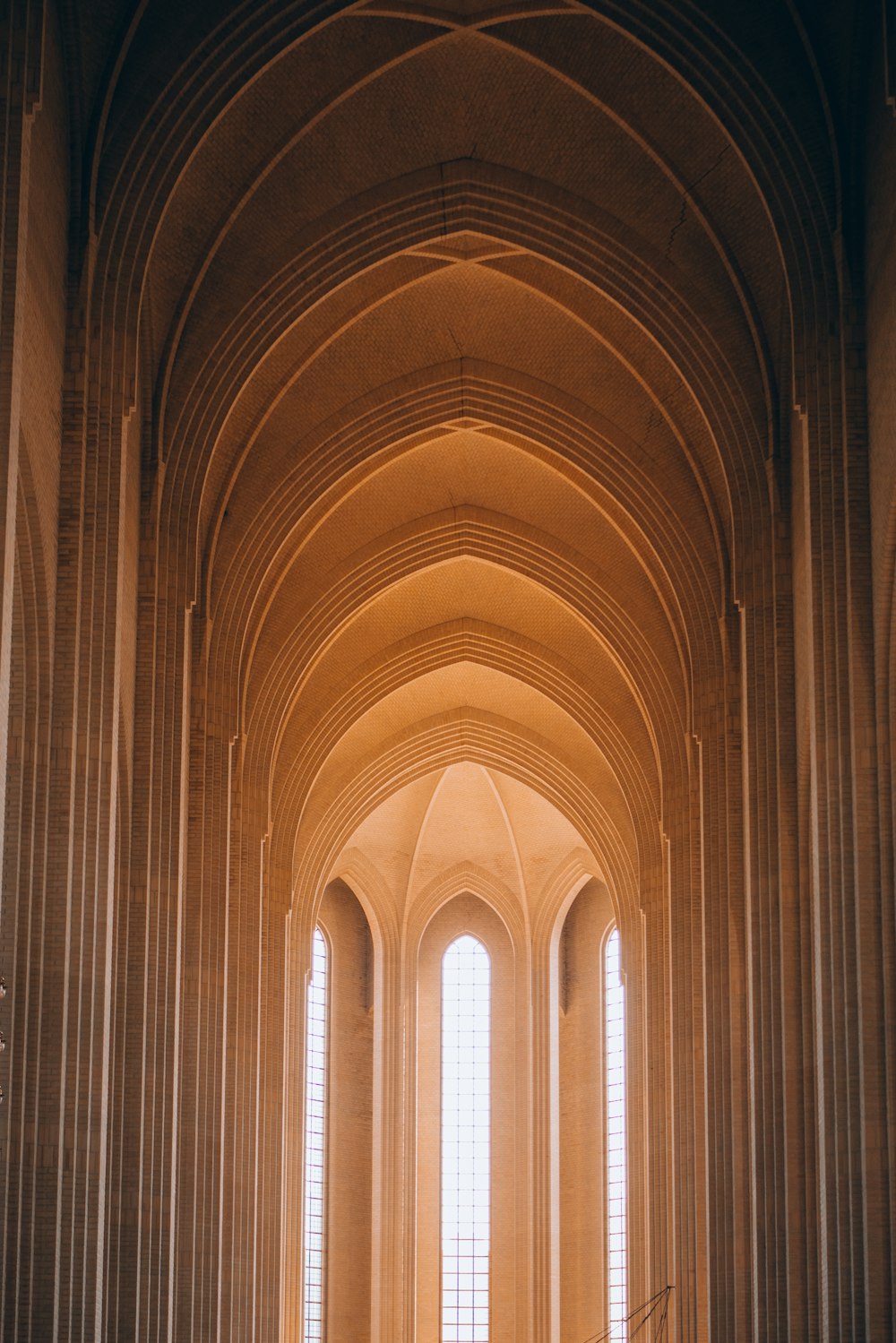 a large arched doorway with arched windows